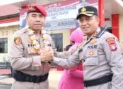 Kapolres Baru Barsel AKBP Jacson R Hutapea Disambut Tradisi Adat dan Pedang Pora