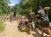 Satgas TMMD ke-125 Tetap Semangat Bangun Jembatan Meski Di Bawah Terik Matahari