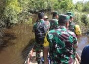 Tim Wasev TNI AD Gunakan Perahu Tinjau Lokasi TMMD ke-124 Kodim 1012/Buntok Hadapi Medan Sulit