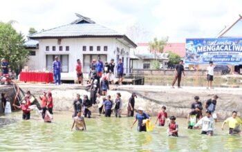 semarak-hut-bhayangkara-ke-80,-wakapolres-barito-selatan-buka-lomba-mengacal-iwak-kapolres-cup-2026,-5.000-ikan-ditebar-dan-diikuti-170-peserta